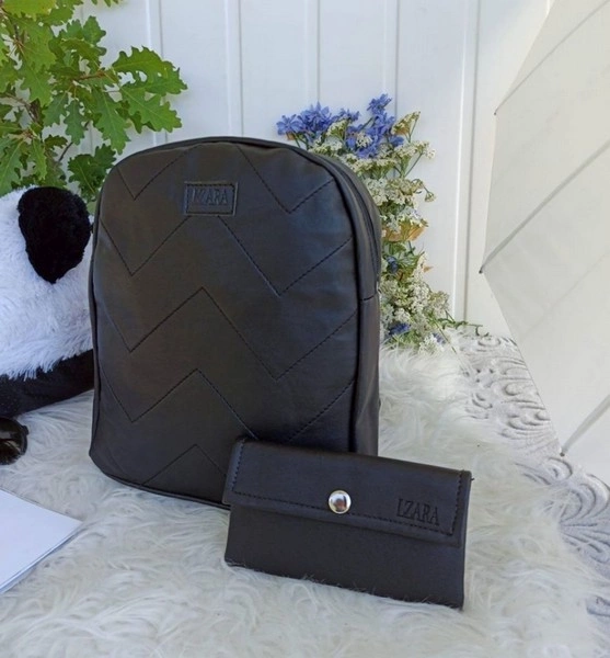 Black leather backpack with purse