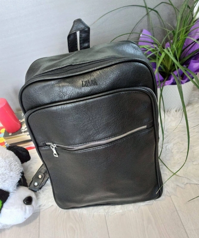 Large black leather backpack