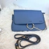 Lovely leather envelope with 5 compartments, wrist chain and long handle