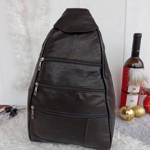 Large handbag made of genuine leather with many pockets