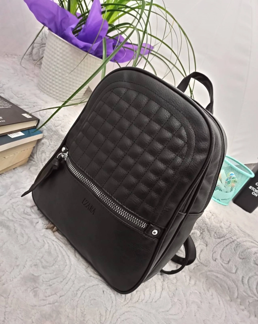 Lovely backpack with two compartments and a pocket