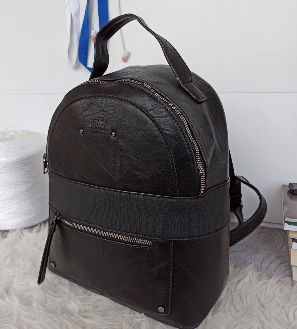 Great backpack made of nice hard leather with many pockets